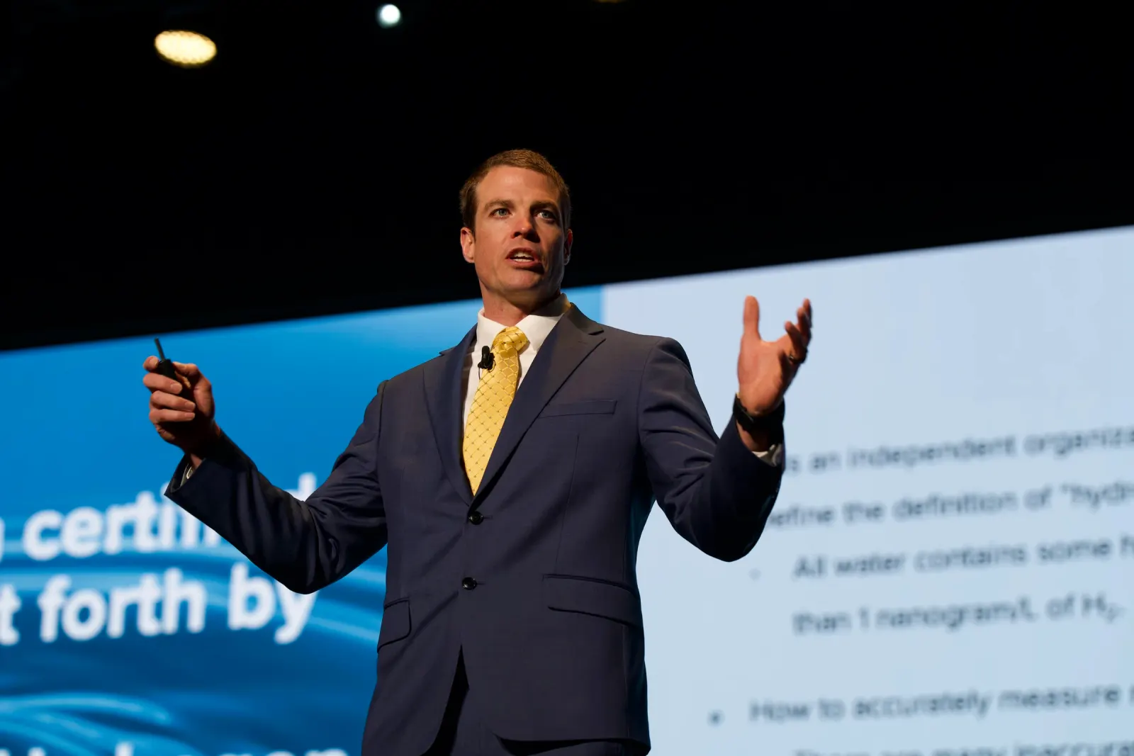 Tyler speaking at a conference or presentation